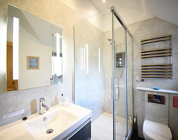 Our Self Catering Accommodation in Waternish contains a modern bathroom with shower and electric towel rail