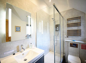 Our Self Catering Accommodation in Waternish contains a modern bathroom with shower and electric towel rail