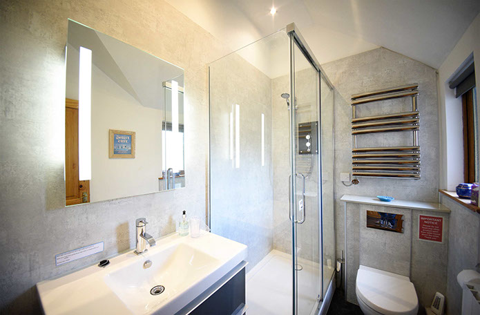 Our Self Catering Accommodation in Waternish contains a modern bathroom with shower and electric towel rail
