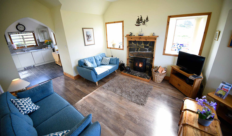 Our Self Catering Accommodation in Waternish contains a Woodburning stove and Open Plan Kitchen Living Room