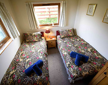 Twin Bedroom accommodation with comfortable beds and WIFI Internet access at Auld Mission Cottage Self Catering in Waternish